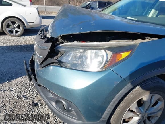 ✅ 2013 Honda CR-V EX-L • VIN: 2HKRM4H70DH692161 • Lot: 43780773. Listed on IAAI with 178,589 mi. Free auction sales archive from the USA and detailed vehicle history report at DreamBid. Image 18.