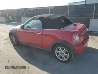 ✅ 2012 MINI Roadster • VIN: WMWSY1C56CT311639 • Lot: 49284425. Listed on Copart with 92,068 mi. Free auction sales archive from the USA and detailed vehicle history report at DreamBid. Image 2.