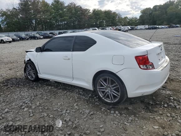 ✅ 2013 Scion tC • VIN: JTKJF5C75D3057381 • Лот: 84770965. Опубликован ранее на Copart с пробегом 188 954 миль. Бесплатный доступ к архиву аукционных продаж из США и подробный отчёт об истории автомобиля на DreamBid. Изображение 2.