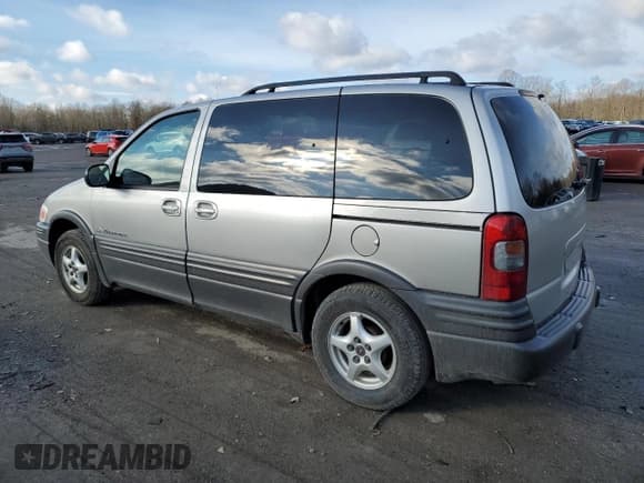 ✅ 2004 Pontiac Montana • VIN: 1GMDU03E44D242328 • Лот: 46984375. Опубликован ранее на Copart с пробегом 76 602 миль. Бесплатный доступ к архиву аукционных продаж из США и подробный отчёт об истории автомобиля на DreamBid. Изображение 2.