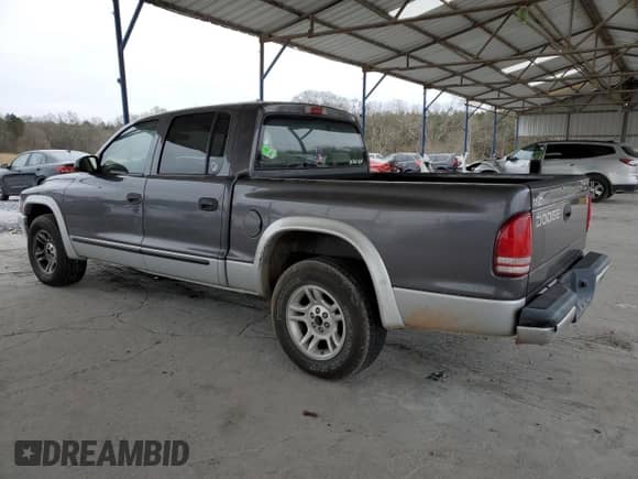 2002 Dodge Dakota SLT z VIN 1B7HL48X32S708723, wystawiony jako Copart lot #41940825 z przebiegiem 112 145 mil mil oraz Szkoda całkowita • Salvage title. Historia ofert i sprzedaży dostępna na DreamBid. Obrazek 2.