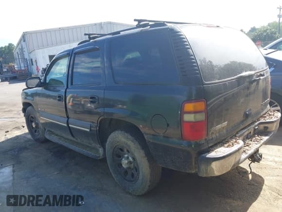 ✅ 2003 Chevrolet Tahoe LS • VIN: 1GNEC13V53R214113 • Lot: 42880317. Listed on IAAI with 264,509 mi. Free auction sales archive from the USA and detailed vehicle history report at DreamBid. Image 3.