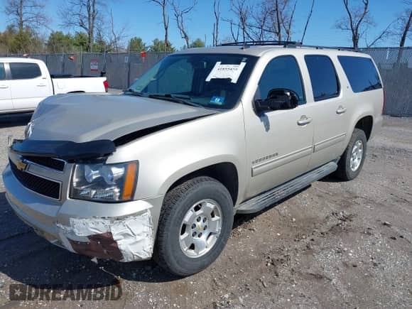 2014 Chevrolet Suburban LT z VIN 1GNSKJE71ER145069, wystawiony jako IAAI lot #41855455 z przebiegiem 197 617 mil mil oraz . Historia ofert i sprzedaży dostępna na DreamBid. Obrazek 17.