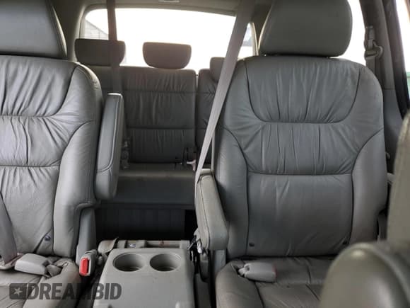 ✅ 2009 Honda Odyssey EX-L • VIN: 5FNRL38689B021475 • Lot: 81481995. Wystawiony na Copart z przebiegiem 300 700 mil. Bezpłatny archiwum sprzedaży aukcyjnych z USA i szczegółowy raport historii pojazdu na DreamBid. Zdjęcie 10.