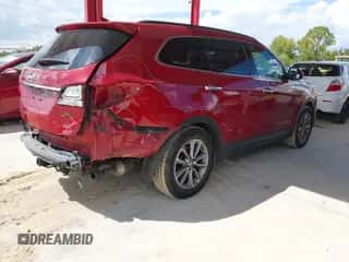 2017 Hyundai Santa Fe SE z VIN KM8SM4HF8HU212190, wystawiony jako IAAI lot #43356896 z przebiegiem 159 648 mil mil oraz . Historia ofert i sprzedaży dostępna na DreamBid. Obrazek 4.