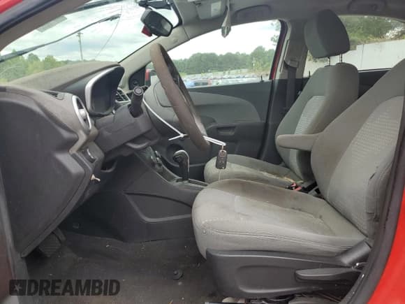 ✅ 2017 Chevrolet Sonic LS • VIN: 1G1JB5SH5H4135986 • Lot: 84257255. Listed on Copart with 192,655 mi. Free auction sales archive from the USA and detailed vehicle history report at DreamBid. Image 7.