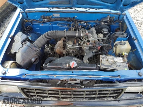 ✅ 1990 Mitsubishi Mighty Max • VIN: JA7FL24W3LP029125 • Lot: 60481485. Wystawiony na Copart z przebiegiem 222 803 mil. Bezpłatny archiwum sprzedaży aukcyjnych z USA i szczegółowy raport historii pojazdu na DreamBid. Zdjęcie 11.