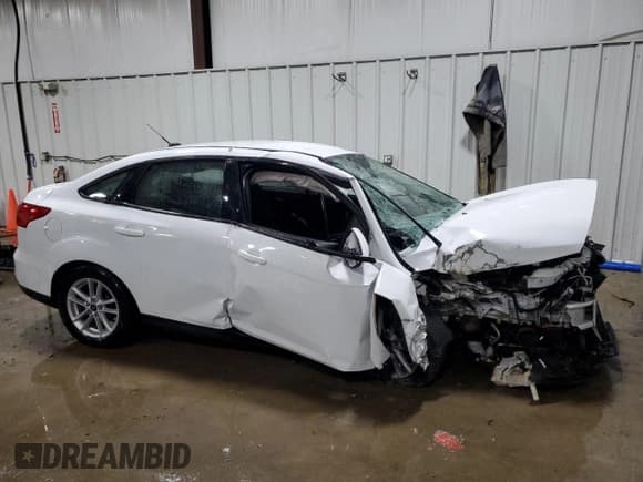 ✅ 2017 Ford Focus SE • VIN: 1FADP3F21HL304929 • Lot: 89460565. Wystawiony na Copart z przebiegiem Nie podano. Bezpłatny archiwum sprzedaży aukcyjnych z USA i szczegółowy raport historii pojazdu na DreamBid. Zdjęcie 4.