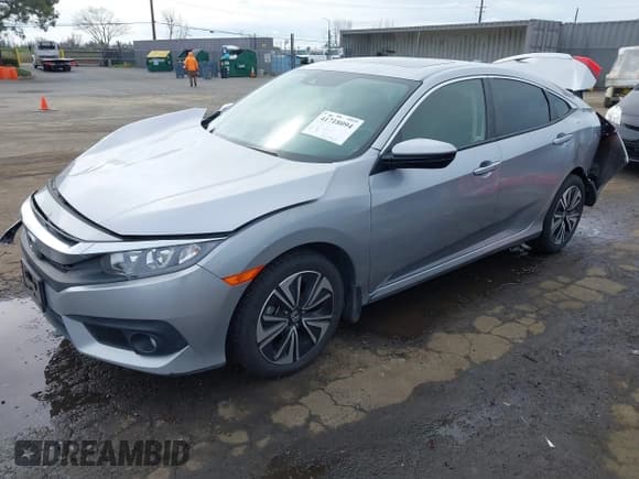 ✅ 2018 Honda Civic EX-L • VIN: JHMFC1F87JX020497 • Lot: 41718094. Listed on IAAI with 77,426 mi. Free auction sales archive from the USA and detailed vehicle history report at DreamBid. Image 2.