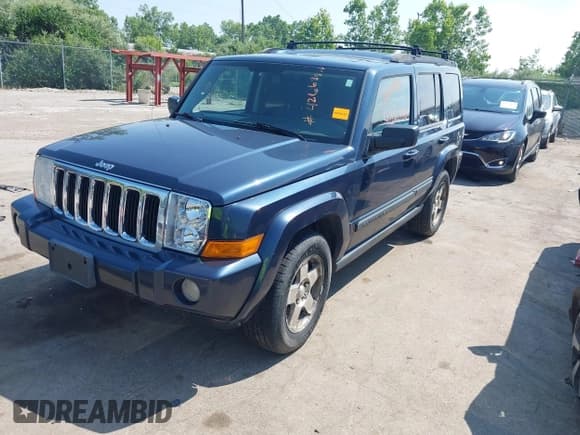 ✅ 2009 Jeep Commander Sport • VIN: 1J8HG48K09C501891 • Lot: 42668886. Listed on IAAI with 163,102 mi. Free auction sales archive from the USA and detailed vehicle history report at DreamBid. Image 2.