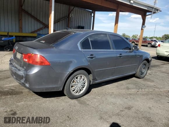 ✅ 2009 Kia Optima LX • VIN: KNAGE228795351564 • Lot: 80873825. Listed on Copart with 174,635 mi. Free auction sales archive from the USA and detailed vehicle history report at DreamBid. Image 3.