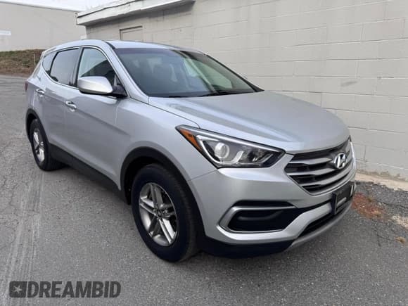 ✅ 2018 Hyundai Santa Fe 2.4L • VIN: 5XYZT3LB6JG565927 • Лот: 92522215. Опубликован ранее на Copart с пробегом 116 009 миль. Бесплатный доступ к архиву аукционных продаж из США и подробный отчёт об истории автомобиля на DreamBid. Изображение 1.