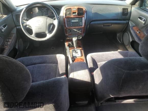 2002 Hyundai Sonata GLS с VIN KMHWF35H92A641858, выставлен на аукционе Copart как лот 80581244 с пробегом 124 020 миль миль и Чистый • Clean title. История ставок и продаж доступна на DreamBid. Изображение 8.