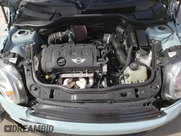 2012 MINI Hardtop with VIN WMWSU3C52CT367682, listed as a Copart auction lot 63045965 with 124,683 mi miles and Salvage title. Bid and sale history available at DreamBid. Image 11.