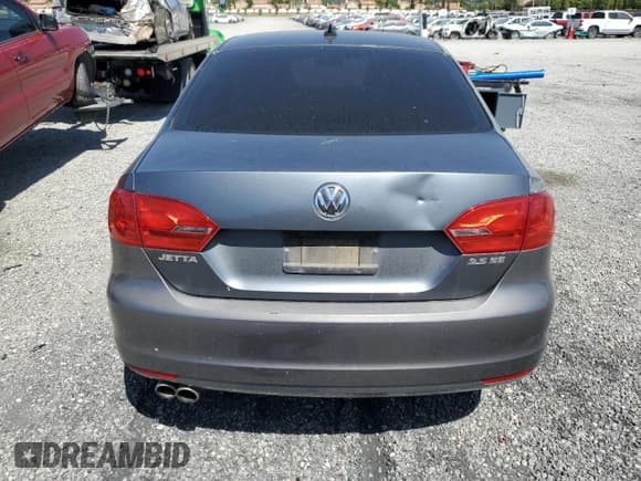 ✅ 2011 Volkswagen Jetta SE • VIN: 3VWDZ7AJ4BM323777 • Lot: 57267705. Listed on Copart with 196,179 mi. Free auction sales archive from the USA and detailed vehicle history report at DreamBid. Image 6.