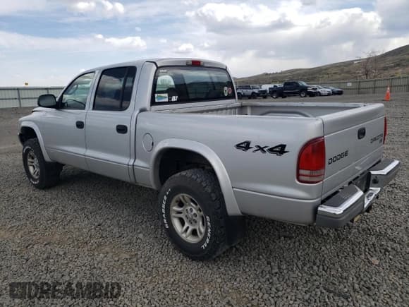 ✅ 2003 Dodge Dakota SLT • VIN: 1D7HG48NX3S261527 • Lot: 52986385. Wystawiony na Copart z przebiegiem 163 807 mil. Bezpłatny archiwum sprzedaży aukcyjnych z USA i szczegółowy raport historii pojazdu na DreamBid. Zdjęcie 2.