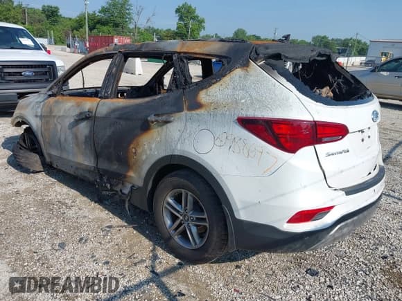 ✅ 2018 Hyundai Santa Fe 2.4L • VIN: 5NMZUDLB3JH059478 • Лот: 42595033. Опубликован ранее на IAAI с пробегом Не указан. Бесплатный доступ к архиву аукционных продаж из США и подробный отчёт об истории автомобиля на DreamBid. Изображение 3.