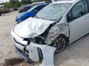 ✅ 2021 Toyota Prius L Eco • VIN: JTDKAMFU7M3132457 • Lot: 43339952. Wystawiony na IAAI z przebiegiem Nie podano. Bezpłatny archiwum sprzedaży aukcyjnych z USA i szczegółowy raport historii pojazdu na DreamBid. Zdjęcie 6.