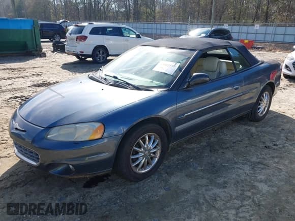 ✅ 2002 Chrysler Sebring Limited • VIN: 1C3EL65R82N166400 • Lot: 43865109. Listed on IAAI with 126,628 mi. Free auction sales archive from the USA and detailed vehicle history report at DreamBid. Image 2.