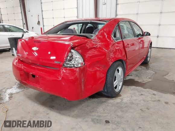 2013 Chevrolet Impala Police with VIN 2G1WD5E37D1224271, listed as a IAAI auction lot 41325592 with 90,009 mi miles and . Bid and sale history available at DreamBid. Image 4.