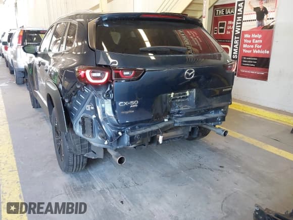 ✅ 2024 Mazda CX-50 S Preferred • VIN: 7MMVABBM8RN218749 • Lot: 42349049. Listed on IAAI with 11,740 mi. Free auction sales archive from the USA and detailed vehicle history report at DreamBid. Image 21.
