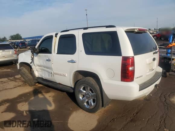2007 Chevrolet Tahoe LTZ z VIN 1GNFK13097J383373, wystawiony jako Copart lot #66365785 z przebiegiem 197 645 mil mil oraz Szkoda całkowita • Salvage title. Historia ofert i sprzedaży dostępna na DreamBid. Obrazek 2.