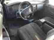 2004 Dodge Dakota with VIN 1D7GL12K94S627063, listed as a Copart auction lot 75315764 with 202,412 mi miles and Salvage title. Bid and sale history available at DreamBid. Image 8.