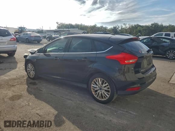 ✅ 2016 Ford Focus Titanium • VIN: 1FADP3N27GL339779 • Lot: 93958385. Listed on Copart with 122,265 mi. Free auction sales archive from the USA and detailed vehicle history report at DreamBid. Image 2.