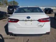 ✅ 2021 Toyota Camry Hybrid LE • VIN: 4T1H31AK3MU566826 • Лот: 43437913. Опубликован ранее на IAAI с пробегом 70 798 миль. Бесплатный доступ к архиву аукционных продаж из США и подробный отчёт об истории автомобиля на DreamBid. Изображение 16.