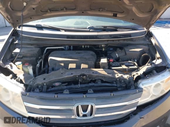 ✅ 2012 Honda Odyssey Touring • VIN: 5FNRL5H94CB106763 • Лот: 43309470. Опубликован ранее на IAAI с пробегом 154 794 миль. Бесплатный доступ к архиву аукционных продаж из США и подробный отчёт об истории автомобиля на DreamBid. Изображение 10.