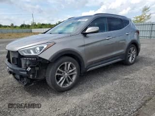 ✅ 2017 Hyundai Santa Fe 2.0T • VIN: 5XYZUDLA0HG455511 • Лот: 68994065. Опубликован ранее на Copart с пробегом 97 159 миль. Бесплатный доступ к архиву аукционных продаж из США и подробный отчёт об истории автомобиля на DreamBid. Изображение 1.