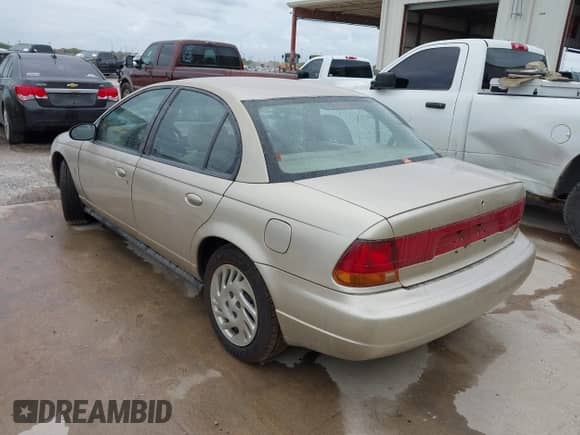 1998 Saturn SL с VIN 1G8ZK5275WZ142402, выставлен на аукционе IAAI как лот 42534417 с пробегом 181 283 миль миль и . История ставок и продаж доступна на DreamBid. Изображение 3.
