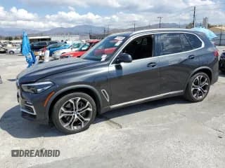 ✅ 2021 BMW X5 xDrive45e • VIN: 5UXTA6C07M9F51926 • Лот: 81501545. Опубликован ранее на Copart с пробегом 83 061 миль. Бесплатный доступ к архиву аукционных продаж из США и подробный отчёт об истории автомобиля на DreamBid. Изображение 1.