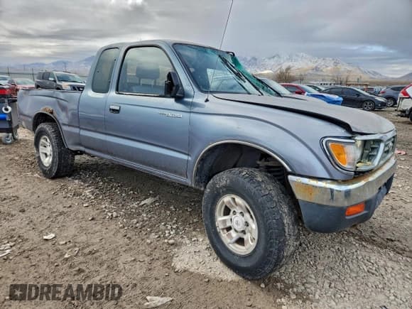 ✅ 1997 Toyota Tacoma • VIN: 4TAWN72N1VZ325400 • Lot: 94828115. Listed on Copart with 289,920 mi. Free auction sales archive from the USA and detailed vehicle history report at DreamBid. Image 4.