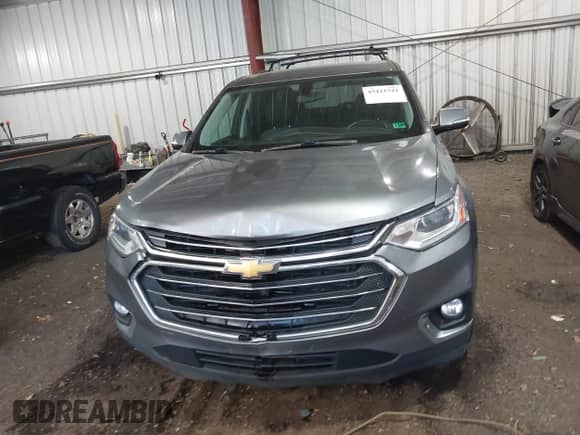2019 Chevrolet Traverse LT Cloth z VIN 1GNERGKW5KJ123254, wystawiony jako IAAI lot #43421541 z przebiegiem 139 567 mil mil oraz . Historia ofert i sprzedaży dostępna na DreamBid. Obrazek 12.