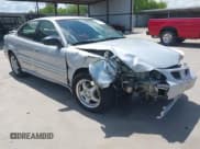 ✅ 2002 Pontiac Grand Am SE1 • VIN: 1G2NF52F12C269276 • Lot: 42581456. Listed on IAAI with 317,082 mi. Free auction sales archive from the USA and detailed vehicle history report at DreamBid. Image 1.