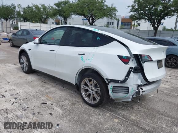 ✅ 2023 Tesla Model Y Long Range • VIN: 7SAYGDEE0PA065534 • Lot: 42445868. Listed on IAAI with 22,638 mi. Free auction sales archive from the USA and detailed vehicle history report at DreamBid. Image 3.