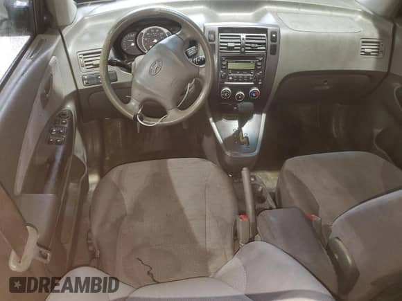 2007 Hyundai Tucson GLS z VIN KM8JM12B47U525445, wystawiony jako Copart lot #83848614 z przebiegiem Nie podano mil oraz Szkoda całkowita • Salvage title. Historia ofert i sprzedaży dostępna na DreamBid. Obrazek 8.