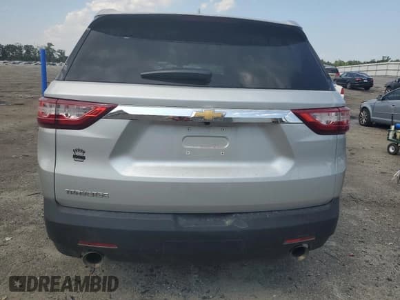 ✅ 2019 Chevrolet Traverse LS • VIN: 1GNERFKW8KJ295899 • Lot: 69132104. Wystawiony na Copart z przebiegiem 91 530 mil. Bezpłatny archiwum sprzedaży aukcyjnych z USA i szczegółowy raport historii pojazdu na DreamBid. Zdjęcie 6.