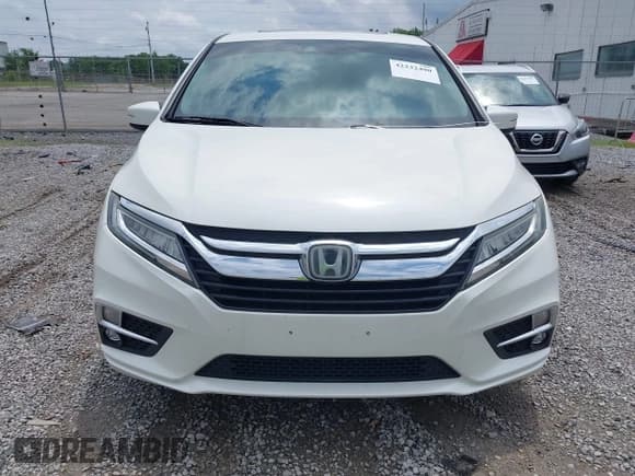 ✅ 2019 Honda Odyssey Elite • VIN: 5FNRL6H95KB104816 • Lot: 42232490. Listed on IAAI with 77,465 mi. Free auction sales archive from the USA and detailed vehicle history report at DreamBid. Image 13.
