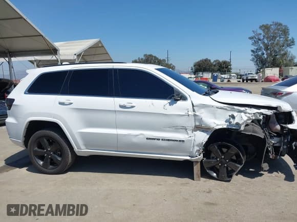 ✅ 2015 Jeep Grand Cherokee Laredo • VIN: 1C4RJEAG5FC713755 • Лот: 41969582. Опубликован ранее на IAAI с пробегом 106 213 миль. Бесплатный доступ к архиву аукционных продаж из США и подробный отчёт об истории автомобиля на DreamBid. Изображение 13.