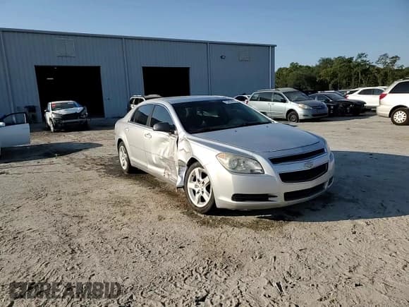 ✅ 2012 Chevrolet Malibu 1LS • VIN: 1G1ZB5E0XCF218402 • Lot: 75465434. Listed on Copart with 233,790 mi. Free auction sales archive from the USA and detailed vehicle history report at DreamBid. Image 13.