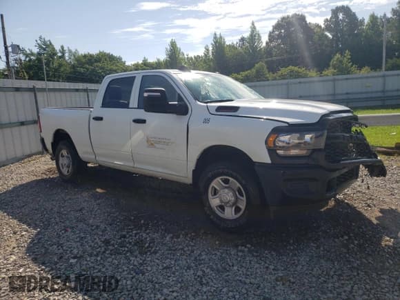 ✅ 2023 Ram 2500 Tradesman • VIN: 3C6UR4CJ3PG586659 • Lot: 59789144. Listed on Copart with 5,378 mi. Free auction sales archive from the USA and detailed vehicle history report at DreamBid. Image 4.