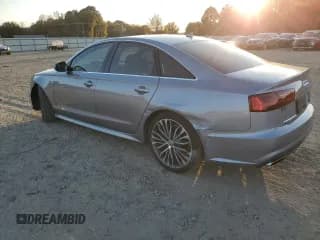 ✅ 2017 Audi A6 Premium • VIN: WAUF8AFC8HN049176 • Лот: 92830285. Опубликован ранее на Copart с пробегом 134 703 миль. Бесплатный доступ к архиву аукционных продаж из США и подробный отчёт об истории автомобиля на DreamBid. Изображение 2.