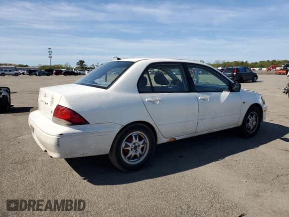 ✅ 2003 Mitsubishi Lancer ES • VIN: JA3AJ26E83U076335 • Лот: 67506825. Опубликован ранее на Copart с пробегом 143 394 миль. Бесплатный доступ к архиву аукционных продаж из США и подробный отчёт об истории автомобиля на DreamBid. Изображение 3.
