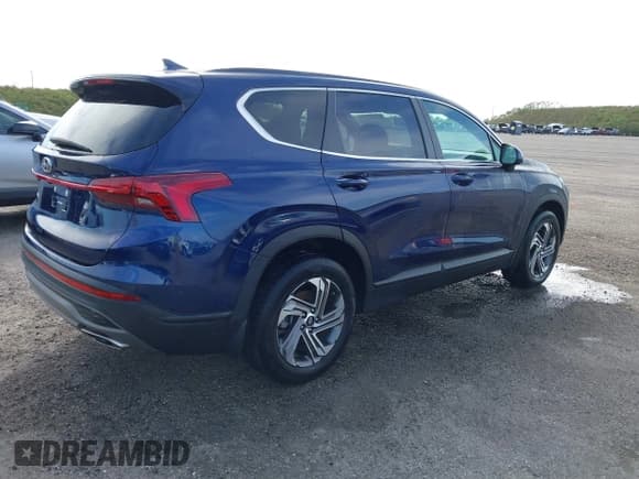 ✅ 2022 Hyundai Santa Fe SE • VIN: 5NMS14AJ6NH449145 • Lot: 40491612. Listed on IAAI with 21,488 mi. Free auction sales archive from the USA and detailed vehicle history report at DreamBid. Image 4.