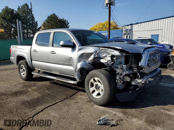 ✅ 2017 Toyota Tacoma TRD Off Road • VIN: 3TMCZ5AN5HM077658 • Lot: 85528835. Listed on Copart with 92,982 mi. Free auction sales archive from the USA and detailed vehicle history report at DreamBid. Image 4.