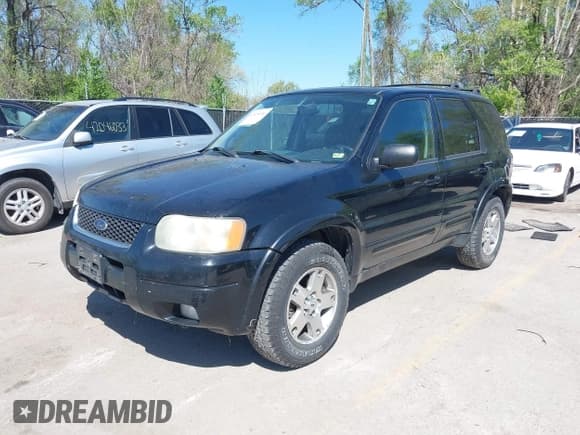 ✅ 2003 Ford Escape Limited • VIN: 1FMCU94103KB90251 • Lot: 42034006. Listed on IAAI with 225,566 mi. Free auction sales archive from the USA and detailed vehicle history report at DreamBid. Image 2.