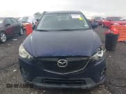 ✅ 2013 Mazda CX-5 Touring • VIN: JM3KE2CE1D0132257 • Lot: 42700625. Listed on IAAI with 87,796 mi. Free auction sales archive from the USA and detailed vehicle history report at DreamBid. Image 12.