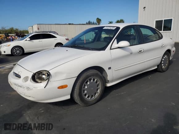 ✅ 1998 Ford Taurus SE Comfort • VIN: 1FAFP53S3WA246260 • Лот: 91224205. Опубликован ранее на Copart с пробегом 167 263 миль. Бесплатный доступ к архиву аукционных продаж из США и подробный отчёт об истории автомобиля на DreamBid. Изображение 1.